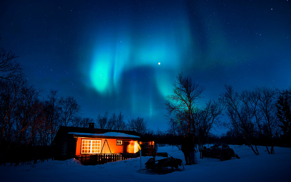 Northern lights over the house in Finland
