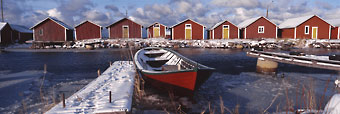 Boat houses in Raippaluoto, located in the narrowest part of the Gulf of Bothnia in the northern part of the Baltic sea.