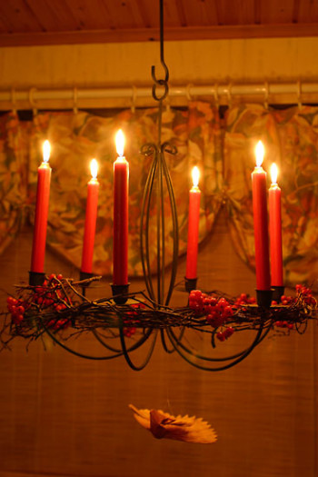 Christmas lights and candles ward off the dark of winter.