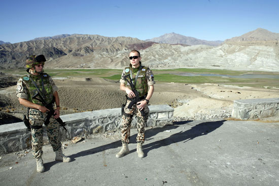 Participating in peacekeeping: Finnish soldiers in the International Security Assistance Force stand in front of the mountains of Afghanistan in 2006.